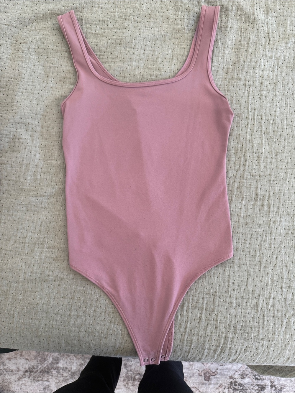 Pink body suit